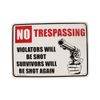 Plastic Sign No Trespassing Shot in the Sun