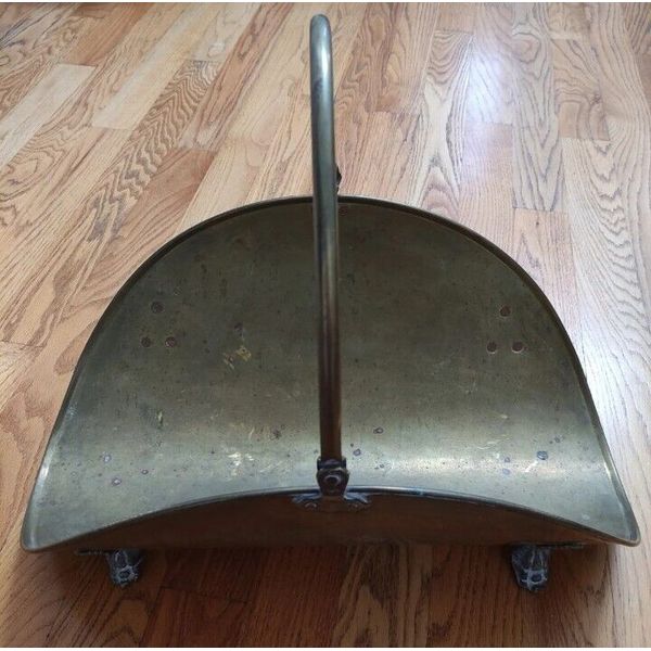 Vintage Regency style brass fireplace log holder claw feet