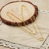 Philip Jones Gold Plated Double Layered Circle Necklace