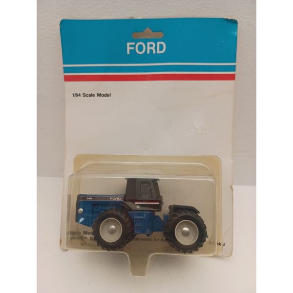 1/64 Scale Model Ford 946 Toy Tractor With Duals.