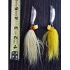 2 Side-Winder Jigging Spoons and treble hooks with bucktail and 6/0 hooks.