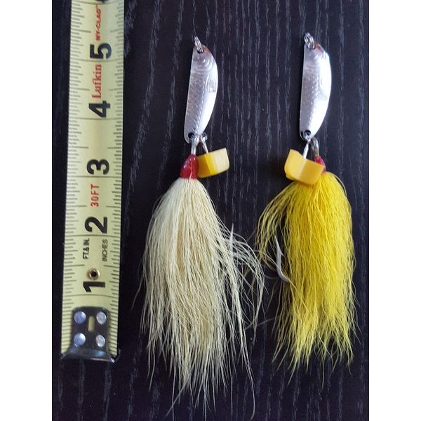 2 Side-Winder Jigging Spoons and treble hooks with bucktail and 6/0 hooks.
