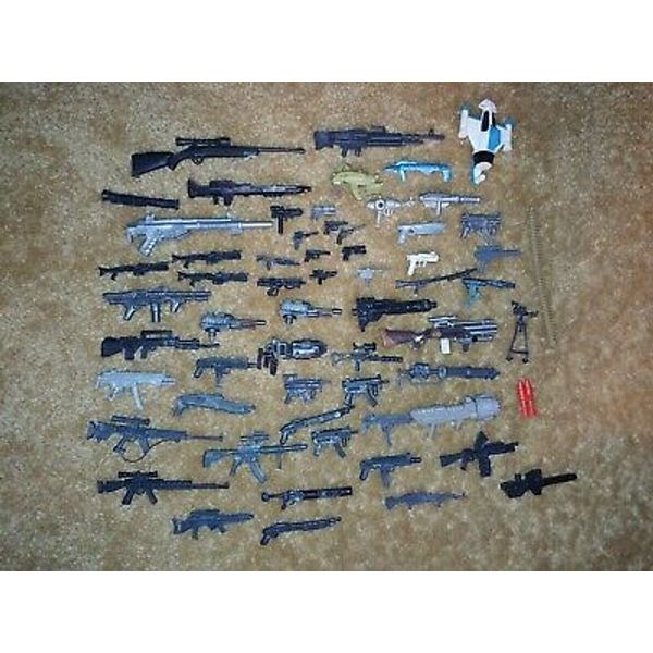 50+ Mixed scale and series random action figure gun accessory lot